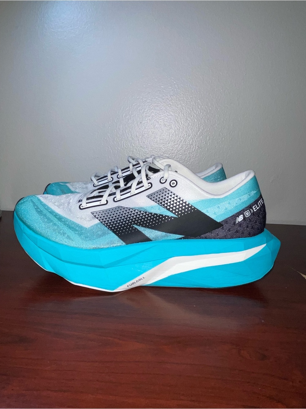New Balance Men’s Turquoise, White & Black FuelCell Elite Running Shoes